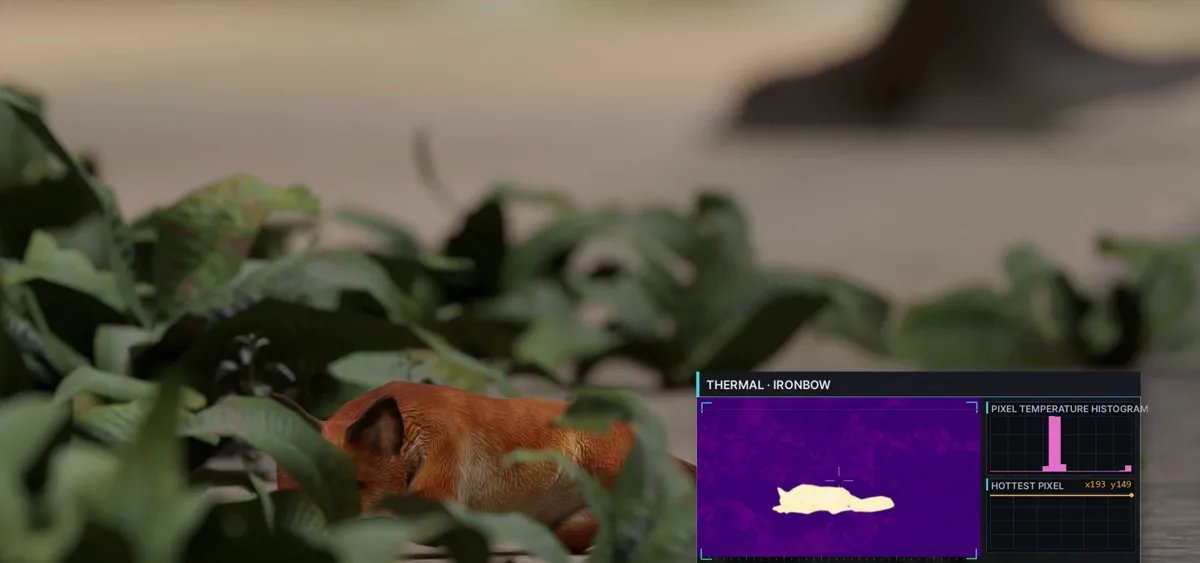 Thermal view (ironbow palette) picking out a warm animal hidden in vegetation, with a pixel temperature histogram and hottest-pixel readout